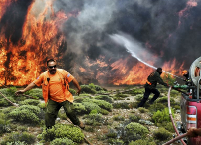 Forest fires rage across Greece