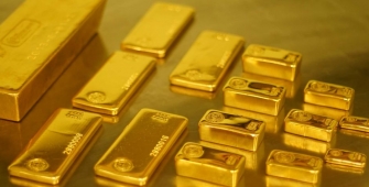 Gold Prices Lower Amid Strong U.S. Economic Data