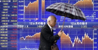 Nikkei Rises on Weaker Yen, Better-Than-Expected Data