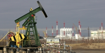 Russia  to cut oil production by 300,000 bpd in first half next year