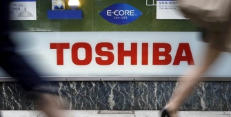 Toshiba Shares Higher on Report Broadcom Named as Chip Unit Buyer