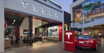 Tesla Deliveries Hit Lower End of Forecasts, Begins Production of New Model