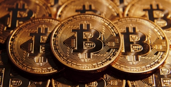 Bitcoin Retreats Farther from June High 
