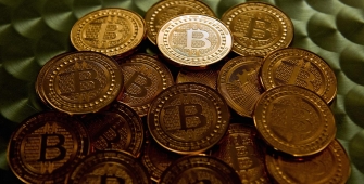 Bitcoin Climbs Nearly 100 Percent from 2018 Low