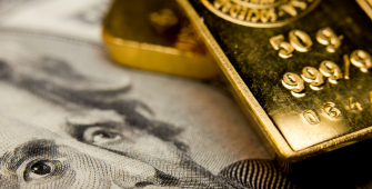 Gold Prices Drop, Weighed Down by Stronger Dollar